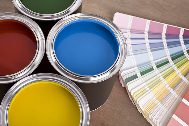 Paint Cans and color chart stock photo