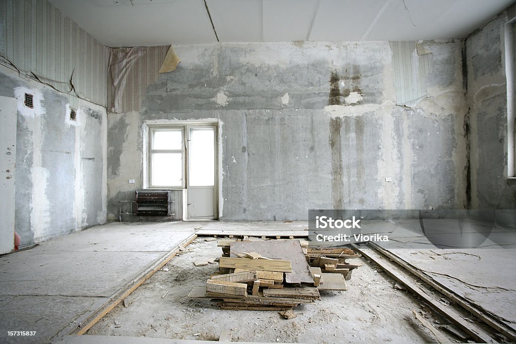 Need renovation Large abandoned room before renovation. Renovation Stock Photo