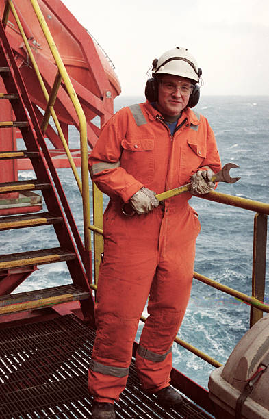 istock Man in work gear working on an oil rig 157315944