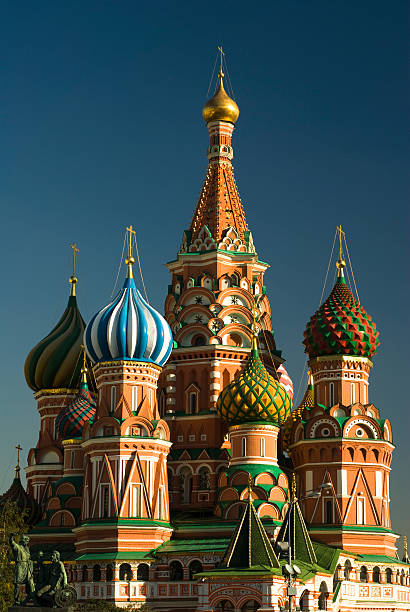 St Basils Cathedral in Red Square, Moscow Evening view of St Basils, the famous and iconic cathedral on Red Square in Moscow kremlin stock pictures, royalty-free photos & images