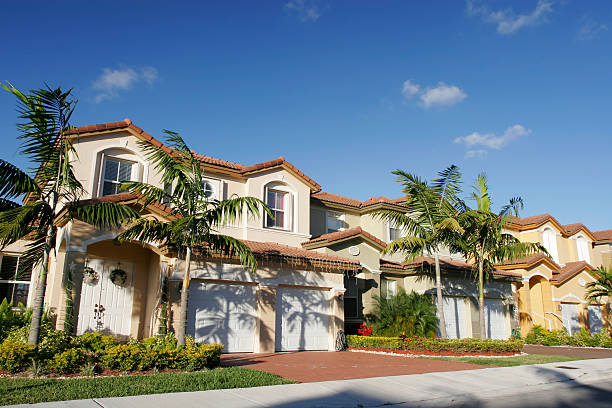 A beautiful house for a single family with palm trees stock photo