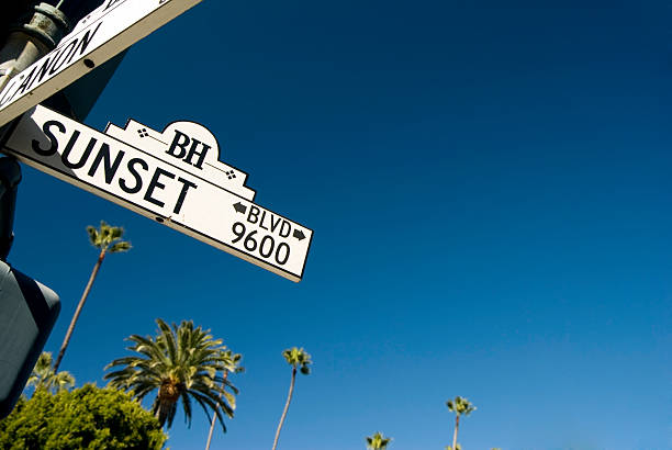 Sunset in the sky Sunset Blvd street sign in Beverly Hills.  sunset strip stock pictures, royalty-free photos & images