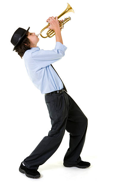 Isolated Portraits-Boy Playing Trumpet Isolated Portraits-Boy Playing Trumpet trumpet player isolated stock pictures, royalty-free photos & images