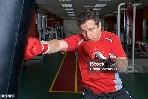 Punching Bag Stock Photo - Download Image Now - 30-34 Years, 35-39 Years, Active Lifestyle