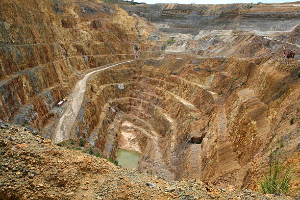 View into the base of the pit of a large open cast gold mine. 