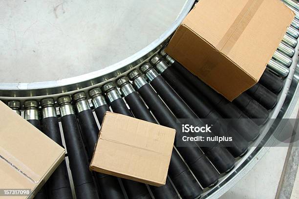 Boxes On Conveyor Belt Stock Photo - Download Image Now - Conveyor Belt, Box - Container, Factory