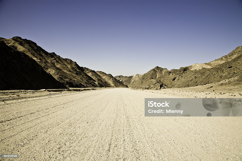 Ländliche Straße durch die Berge - Lizenzfrei Schotterstrecke Stock-Foto