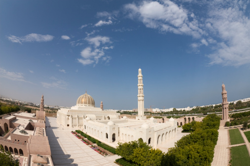 Minaret and surrounding wall of Sultan Qaboos Grand Mosque Muscat, Oman, Middle East, Arabia.