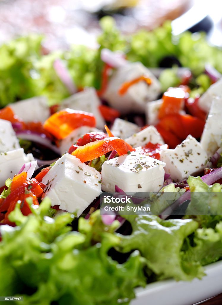 Close-up photo of a Greek salad with feta chunks and pepper Fresh Greek Salad Salad Stock Photo
