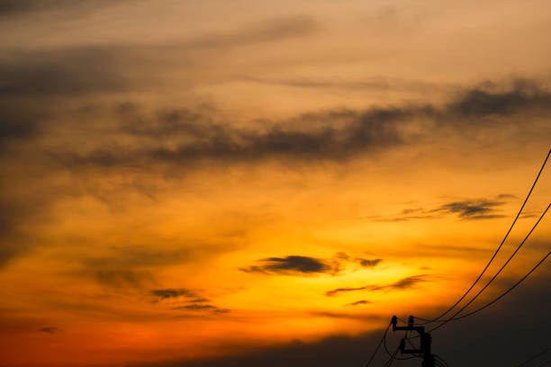 Evening sunlight with silhouette electric wire.