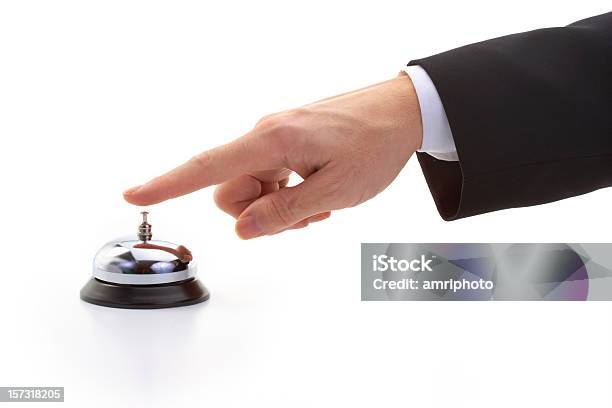 Finger Of Businessman Ringing Reception Bell Stock Photo - Download Image Now - Bell, Arrival, Business