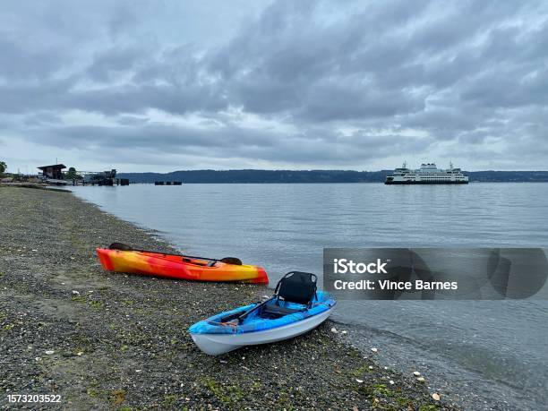 Kayaks In Mukilteo Washington Stock Photo - Download Image Now - Aquatic Sport, Beach, Coastline