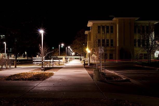 Campus Life A deserted walkway on the Utah State Campus in Logan, UT. utah state university stock pictures, royalty-free photos & images