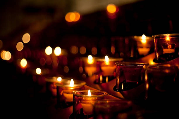 istock Church candles in transparent chandeliers 157321733
