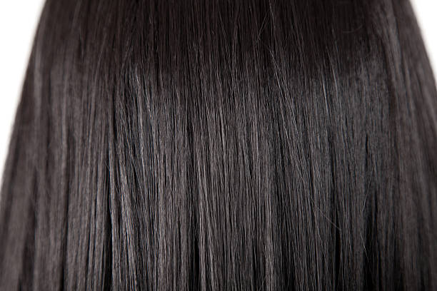 istock Texture of black shiny straight hair 157326736