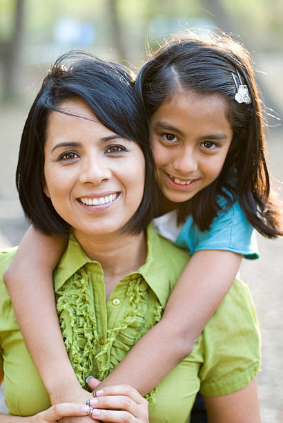 istock Mother and Daughter in a sunny day 157327484