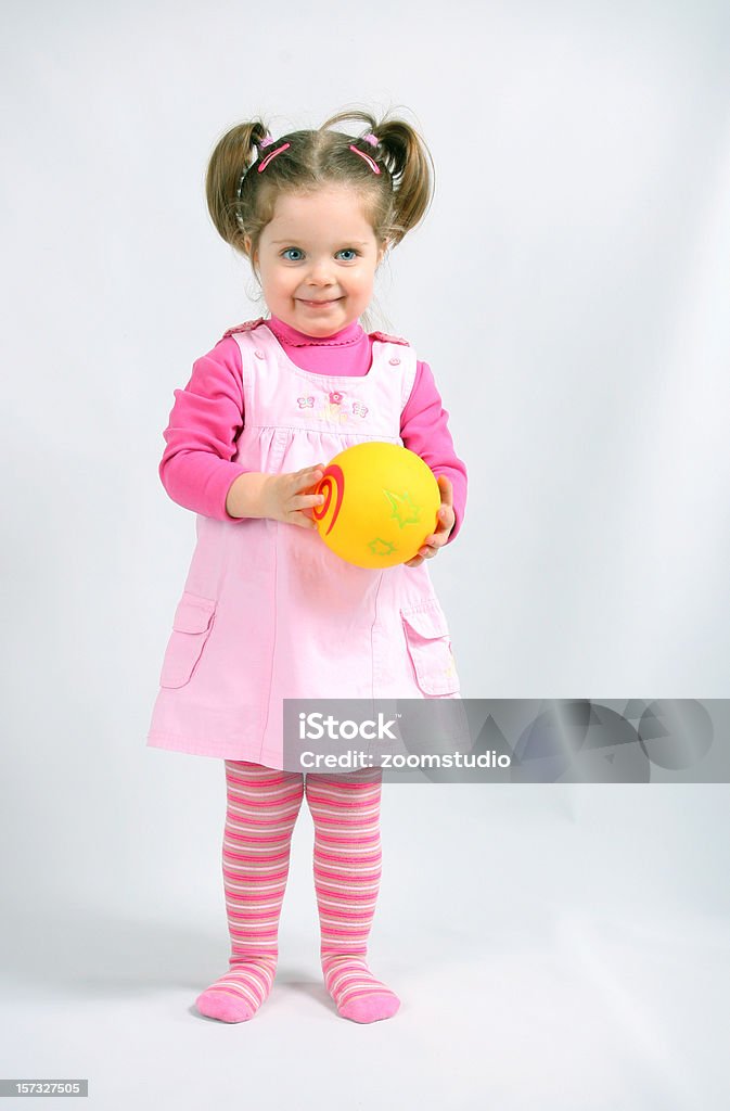 Bebé niña con bola - Foto de stock de Chica adolescente libre de derechos