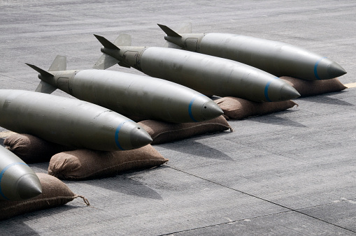 Weapons of war on a tarmac runway.