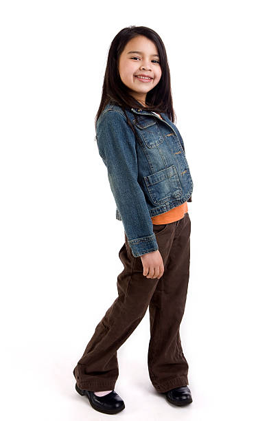 Asian and Hispanic Mixed Elementary Age Girl on White, Copyspace  corduroy jacket stock pictures, royalty-free photos & images