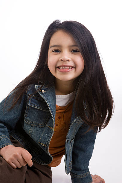 istock Adorable Mixed Asian Hispanic Elementary Age Girl Portrait on White 157327590