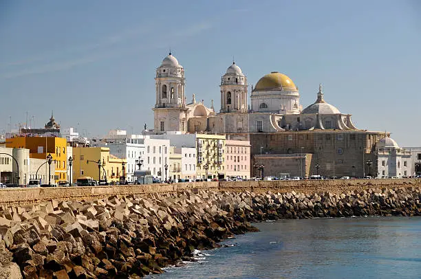 Cádiz is a city and port in the    Cádiz province in SW Spain.It is located in the Gulf of Cádiz.View on the baroque cathredral with golden cupola.
