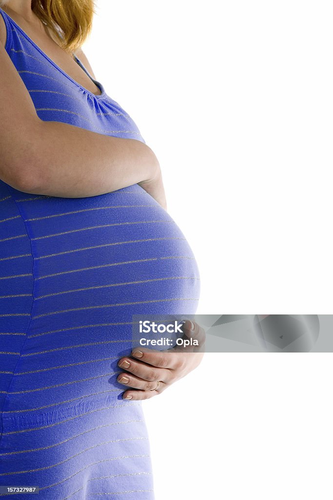 Pregnant belly Pregnant belly isolated against white background Abdomen Stock Photo