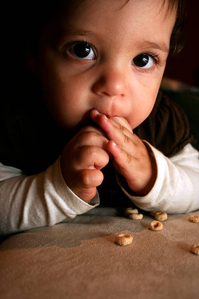 赤ちゃんのおつまみ - eating cereal student human mouth ストックフォトと画像