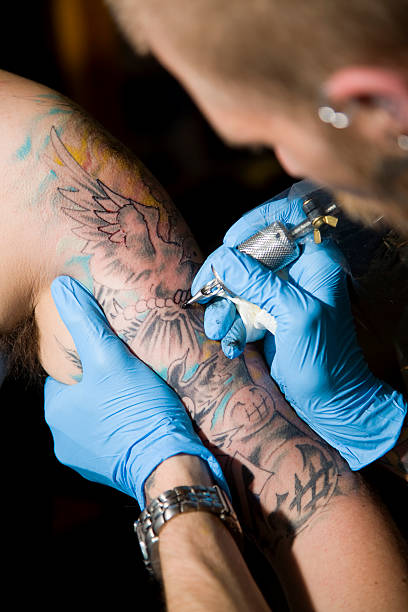 istock Tattoo Artist 157328349
