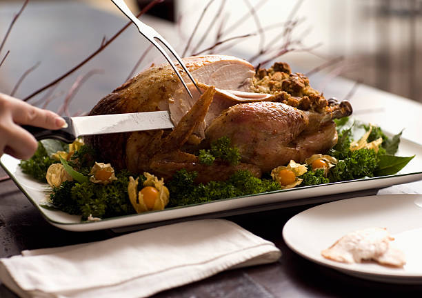 intaglio turchia - turkey carving portion dinner foto e immagini stock