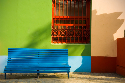 Colorful facade with bench in the street, La Boca
