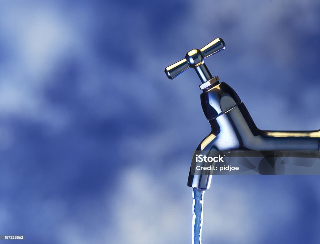 running water from tap  Faucet Stock Photo