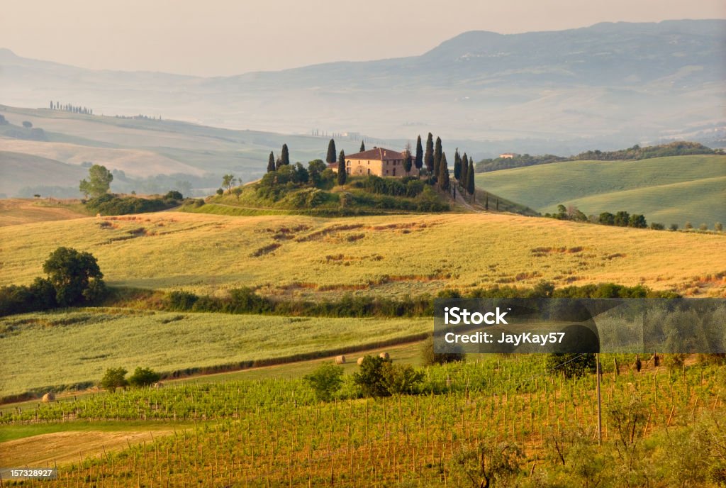 Hills and landscape of Tuscany Belvedere farm house in Valley D'Orcia between Pienza and San Quirico d'Orcia in Tuscany Italy Tuscany Stock Photo