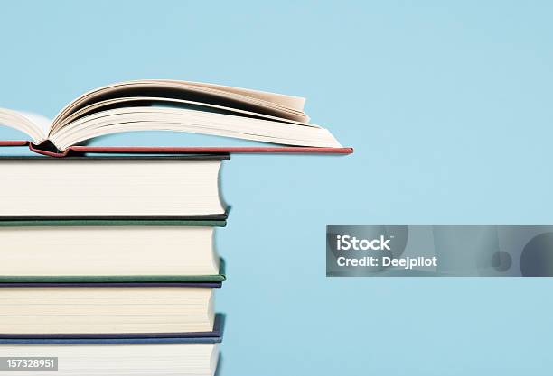 Pile Of Books Profile View Stock Photo - Download Image Now - Book, Stack, Open