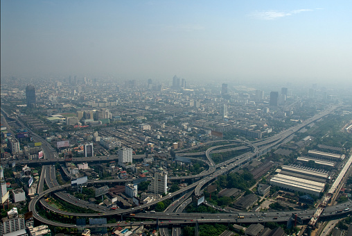 Buildings in Bangkok highlighting the pollution problem showing the smog on a relatively clear day. Part of a series of photos and videos of pollution and global warming issues.