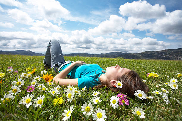 istock Girl resting in meadow 1 157329472