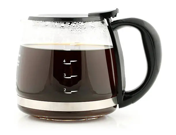 A glass coffee carafe full of 5 cups of coffee.