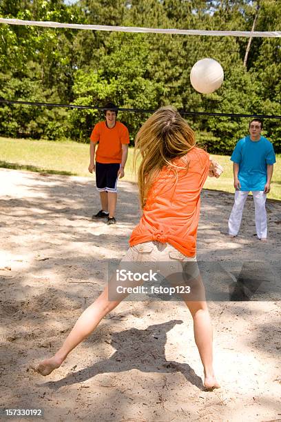 Teenagers Playing Volleyball In The Summer Stock Photo - Download Image Now - Volleyball - Sport, Outdoors, Leisure Games