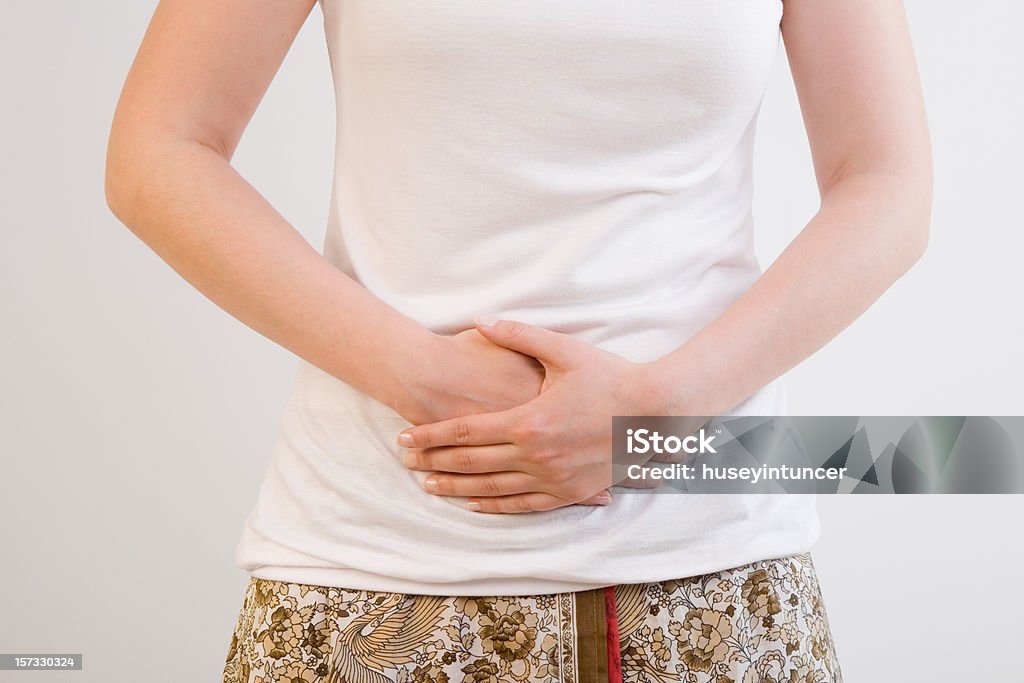 Dolor de estómago - Foto de stock de Adolescente libre de derechos