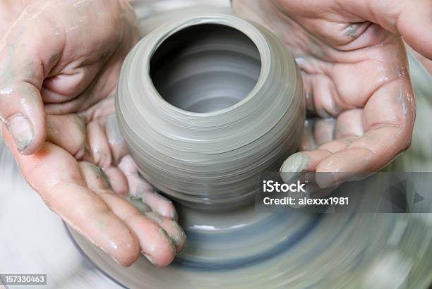 Potter Makes A Jug Out Of Clay Stock Photo - Download Image Now - Potter, Wheel, Sculpture