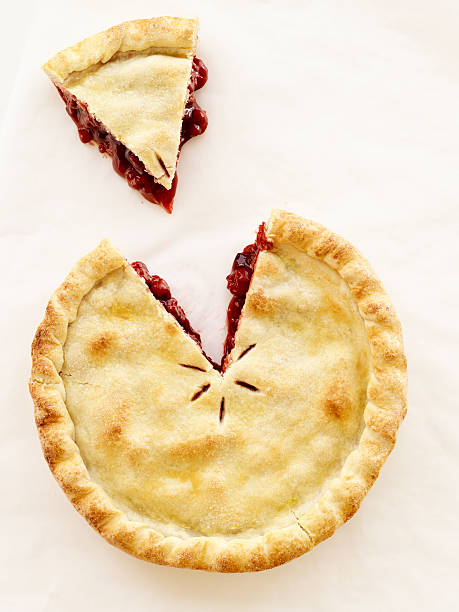 Cut out piece of cherry pie on white background stock photo