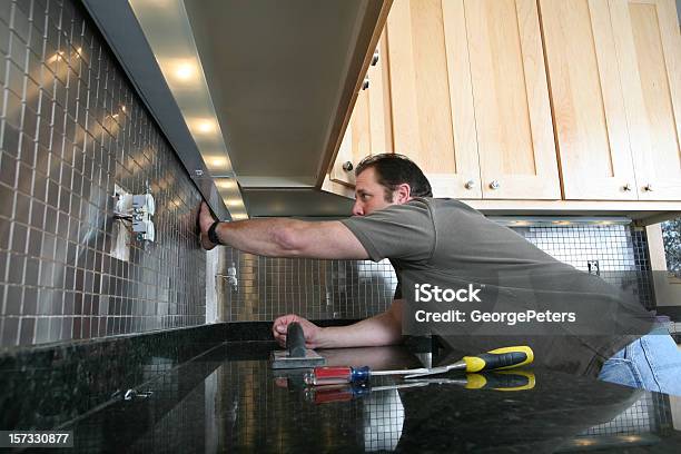 Installing Kitchen Back Splash Stock Photo - Download Image Now - Tile, Installing, Home Addition