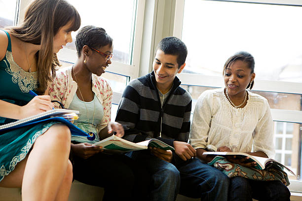 istock further education: diverse group of teenagers waiting for class 157331371