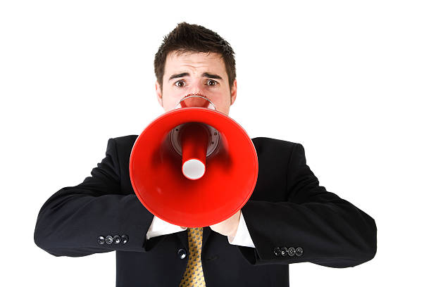 istock Professional Businessman screaming in a Megaphone 157331521