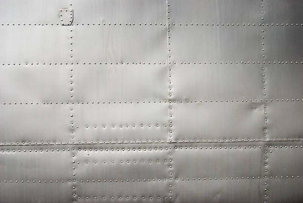 istock Aircraft siding background with rivets and soft shadows 157331525