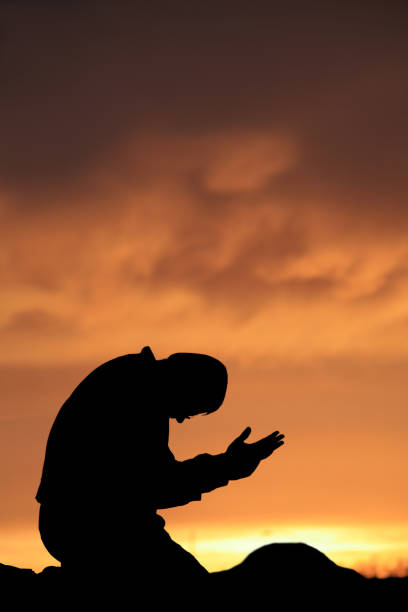 istock Middle Aged Caucasian Man Praying Outside 157331818
