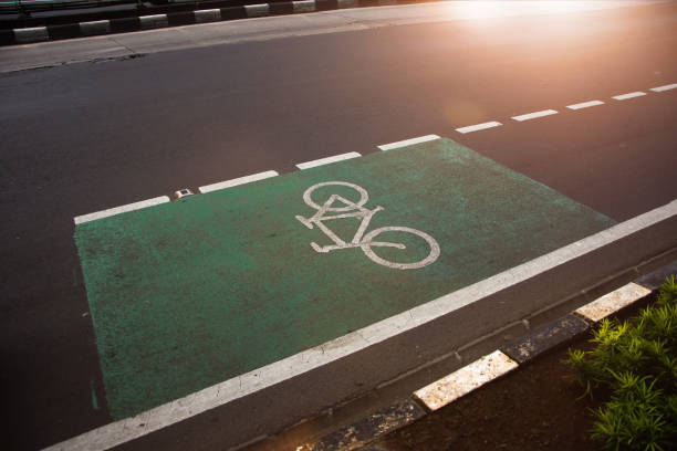 istock Bicycle lane sign on the street 1573318472