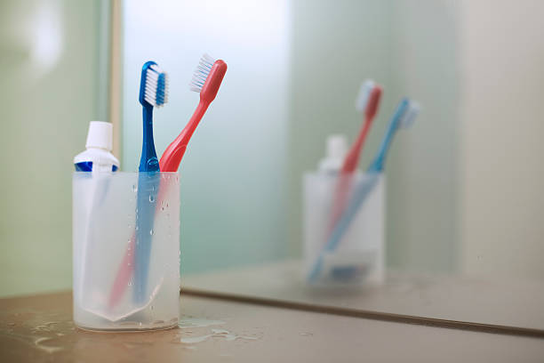 Two tooth brushes  toothbrush stock pictures, royalty-free photos & images