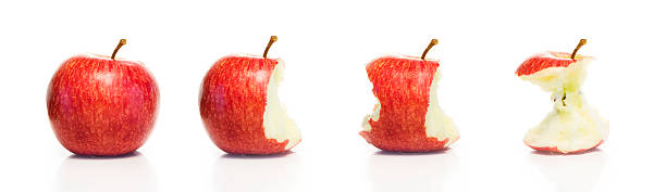 Timeline of eating an Apple (XXL)  apple with bite out stock pictures, royalty-free photos & images