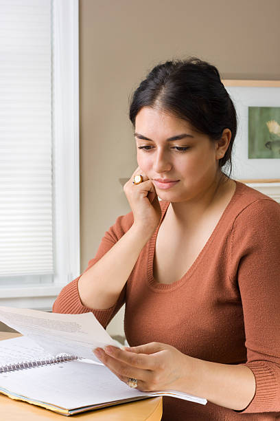 istock Adult Woman Student Studying for University Exam, Thinking and Learning 157332134