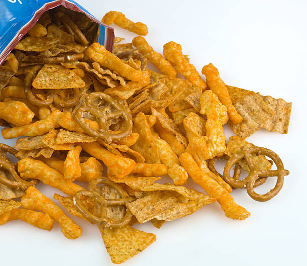 Bag of party mix snacks on white background
